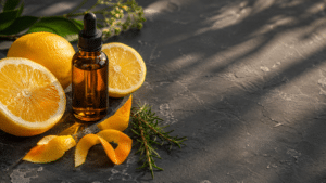 Citrus and amber essence still life