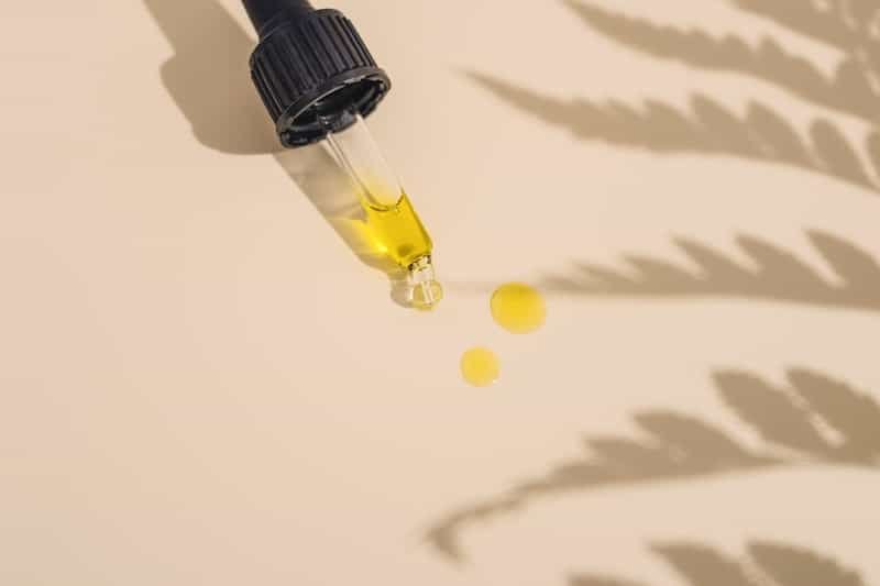 Dropper from a Delta-8 tincture bottle, a common bulk product format