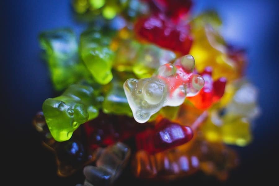 A close-up pile of translucent coloured gummies