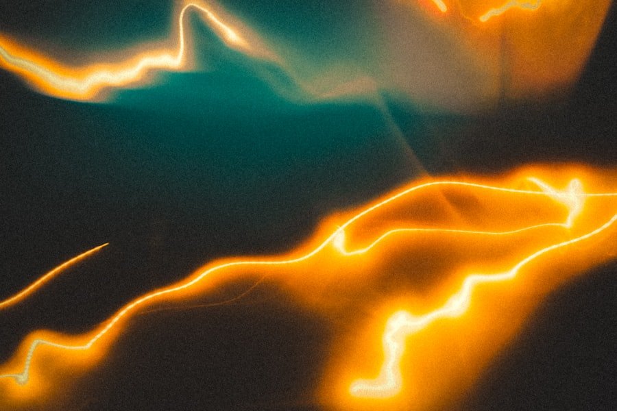 Glowing orange light trails against a dark background