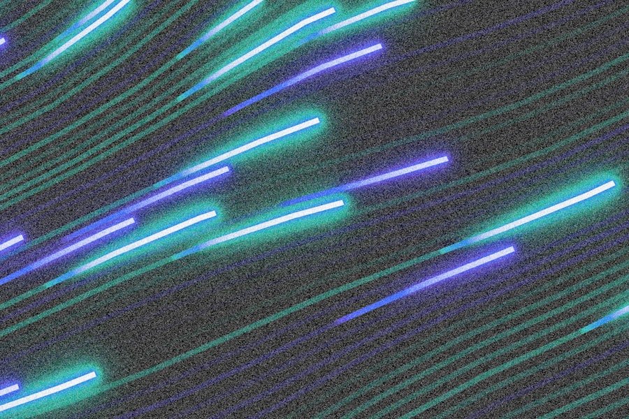 Abstract streaks of blue and green light