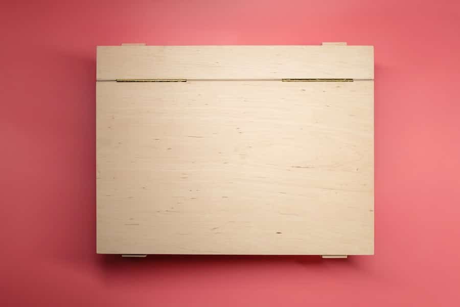 A closed pale wooden box viewed from above