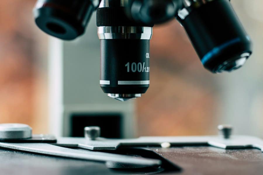 A close view of the objective lenses on a laboratory microscope